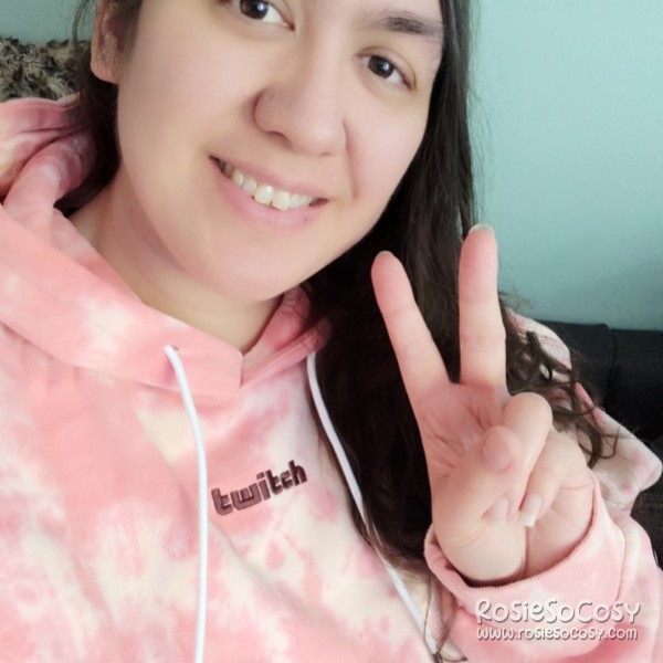 Rosie wearing the pink tie dye Twitch hoodie