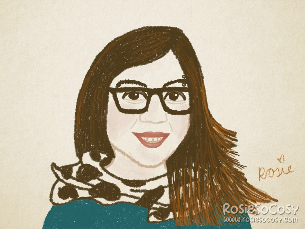 It's a self portrait of Rosie. Rosie has dark brown hair, with some lighter/reddish brown highlights and ends. Rosie is wearing black frame Ray-Ban glasses, and an eyebrow piercing on her left eyebrow. Her skin is the same colour as the background, which is a creamy beige. Her eyes are brown and friendly. Rosie has a wide nose and pink full lips. She is smiling with her lips slightly parted, so you can see her teeth a little. Rosie is wearing a turquoise coloured long sleeved shirt and a cow print scarf.